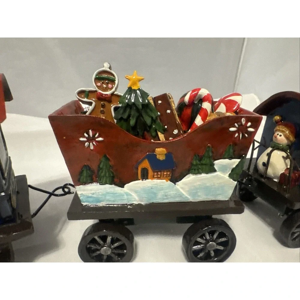 Sterling 3 Piece Resin  Santa,‎ Snowman and Tree Christmas Train Set.